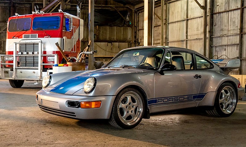 Porsche 911 Carrera RS 3.8 และ Transformers เปิดตัวสมาชิกออโต้บ็อตส์ใหม่ นาม "Mirage"